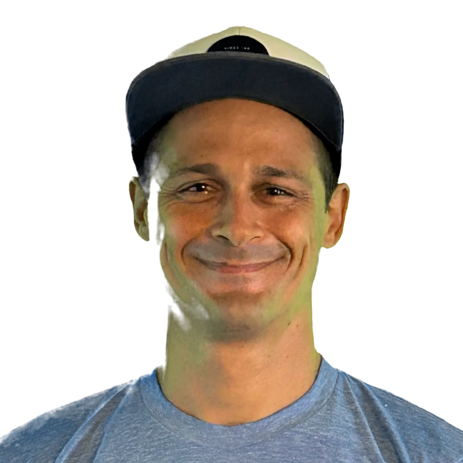 Gibran Garcia, smiling, in a cap and a blue t-shirt